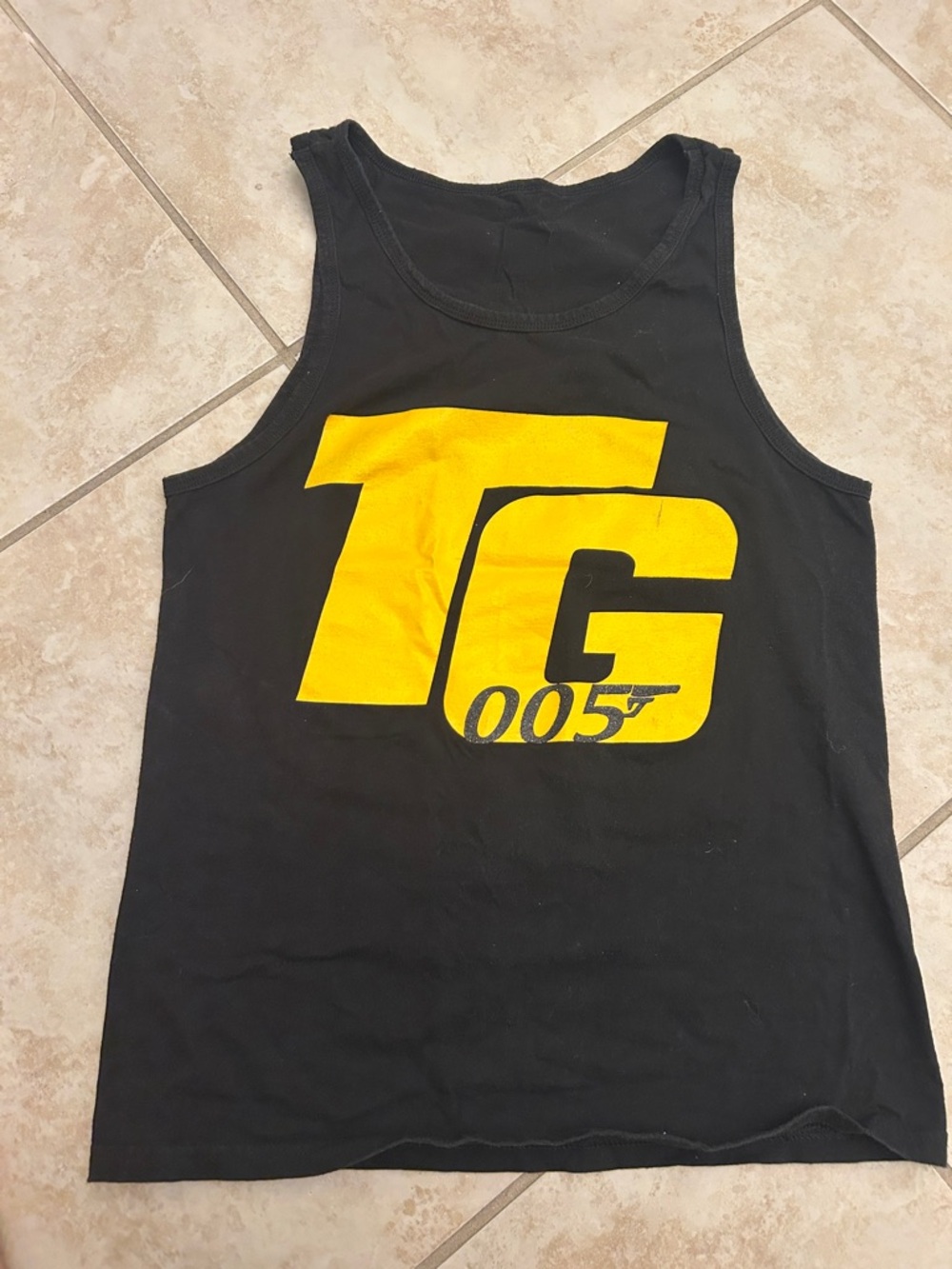 TG Black Tank Top with Bold Yellow OO5 Graphic